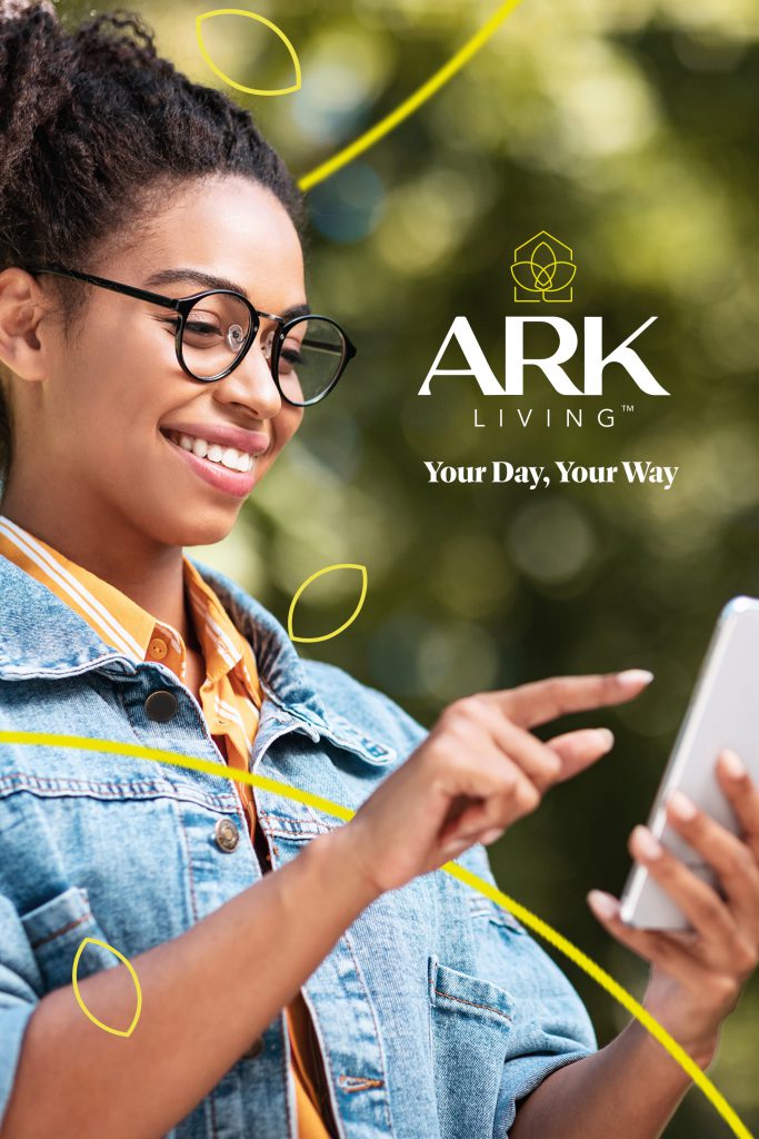 Lady on phone using ARK Living App